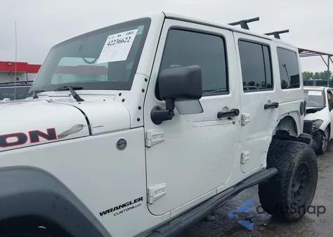 2014 Jeep Wrangler Unlimited Rubicon из США, поврежденный, VIN 1C4HJWFG4EL104827